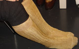 PITTI UOMO 79, Firenze, 11-14 gennaio 2011 | L'ormai famosa calza d'oro presso lo stand GALLO che l'ha realizzata
