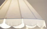 Emanuele Magini - MaginiDesignStudio, Calendarlamp - lampada con palaume rivestito in carta intagliate ai bordi con fascette giornaliere | Collezione PrimoAprile, 2011